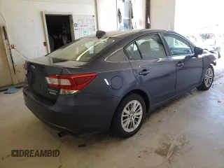 2017 Subaru Impreza Premium with VIN 4S3GKAD61H3613655, listed as a Copart auction lot 63148412 with 75,425 mi miles. Bid and sale history available at carsss.com. Image 4.