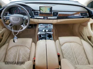 2014 Audi A8 3.0T with VIN WAURGAFD1EN013057, listed as a Copart auction lot 61161595 with 103,560 mi miles and Salvage title. Bid and sale history available at DreamBid. Image 8.