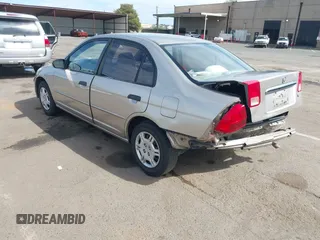 2001 Honda Civic LX with VIN 2HGES16511H554168, listed as a IAAI auction lot 42009621 with 163,801 mi miles. Bid and sale history available at carsss.com. Image 3.