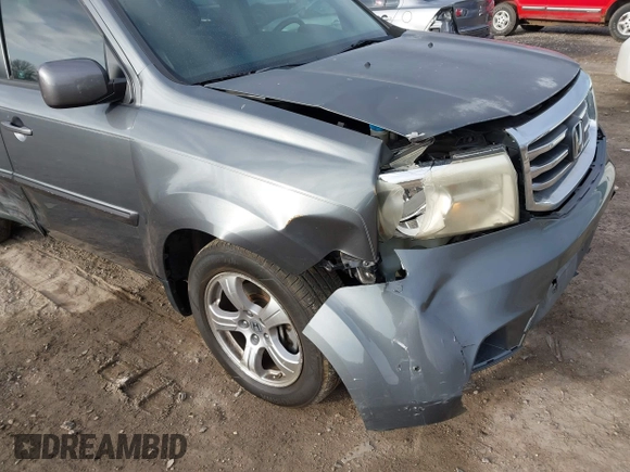 2012 Honda Pilot EX-L with VIN 5FNYF4H50CB074243, listed as a IAAI auction lot 41881319 with 167,727 mi miles and . Bid and sale history available at DreamBid. Image 18.