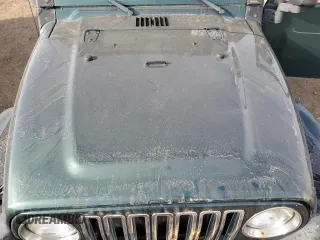 2000 Jeep Wrangler Sahara with VIN 1J4FA59S6YP739265, listed as a Copart auction lot 87437674 with 208,638 mi miles and Clean title. Bid and sale history available at DreamBid. Image 11.