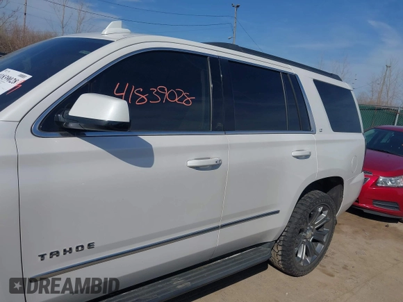 2016 Chevrolet Tahoe LT with VIN 1GNSKBKC8GR391160, listed as a IAAI auction lot 41839028 with 172,273 mi miles and . Bid and sale history available at DreamBid. Image 14.
