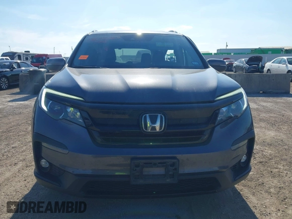 2021 Honda Pilot Special Edition with VIN 5FNYF5H27MB040801, listed as a IAAI auction lot 41656669 with 54,764 mi miles and . Bid and sale history available at DreamBid. Image 12.