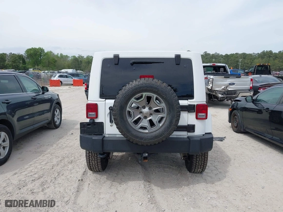 2015 Jeep Wrangler Unlimited Rubicon Hard Rock with VIN 1C4HJWFG7FL684057, listed as a IAAI auction lot 41963885 with 103,240 mi miles. Bid and sale history available at carsss.com. Image 16.