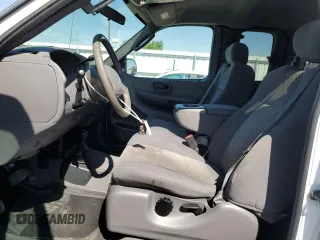 2003 Ford F-150 XL with VIN 1FTRX18L63NA76059, listed as a Copart auction lot 60846555 with 57,346 mi miles and Salvage title. Bid and sale history available at DreamBid. Image 7.