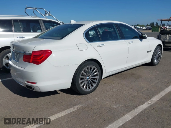 2012 BMW 7 Series 740i with VIN WBAKA4C51CDS99206, listed as a IAAI auction lot 42555719 with 104,303 mi miles and . Bid and sale history available at DreamBid. Image 4.
