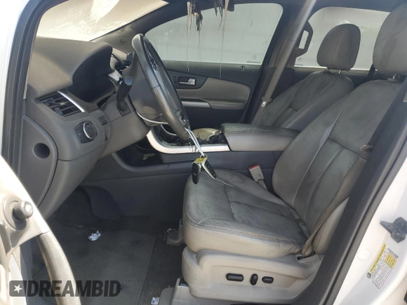 2013 Ford Edge Limited z VIN 2FMDK3KC1DBA39815, wystawiony jako Copart lot #52319795 z przebiegiem 223 758 mil mil oraz Szkoda całkowita • Salvage title. Historia ofert i sprzedaży dostępna na DreamBid. Obrazek 7.