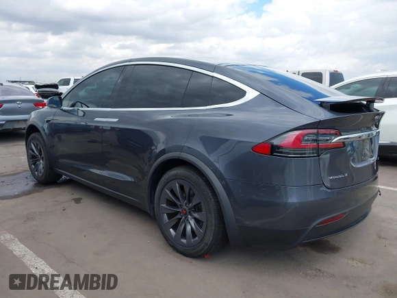 2018 Tesla Model X 75D with VIN 5YJXCBE29JF126629, listed as a IAAI auction lot 42205838 with 47,343 mi miles and . Bid and sale history available at DreamBid. Image 3.