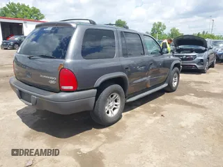 2003 Dodge Durango Sport z VIN 1D4HS38NX3F571790, wystawiony jako IAAI lot #42331620 z przebiegiem 254 130 mil mil oraz . Historia ofert i sprzedaży dostępna na DreamBid. Obrazek 4.