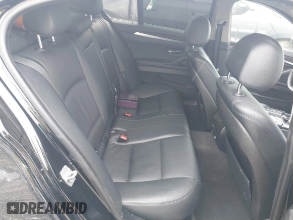 2014 BMW 5 Series 535d with VIN WBAXA5C51ED691018, listed as a IAAI auction lot 41887112 with 174,684 mi miles and . Bid and sale history available at carsss.com. Image 8.