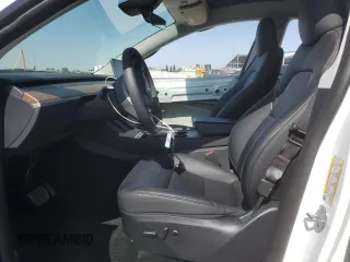 2024 Tesla Model Y Long Range with VIN 7SAYGAEE2RF103110, listed as a Copart auction lot 59422975 with 13,572 mi miles and Salvage title. Bid and sale history available at DreamBid. Image 7.