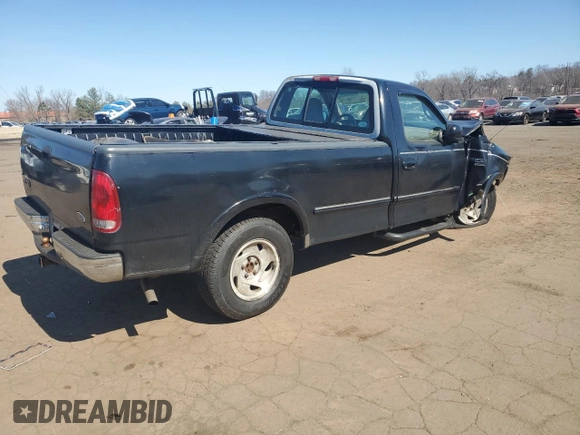 1998 Ford F-150 with VIN 1FTRF18L7WNA73159, listed as a Copart auction lot 48682685 with 71,261 mi miles and Salvage title. Bid and sale history available at DreamBid. Image 3.