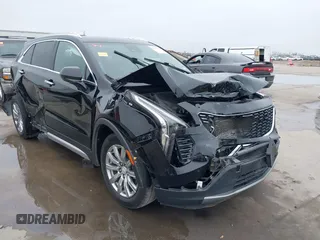 2020 Cadillac XT4 AWD Premium Luxury with VIN 1GYFZDR47LF122394, listed as a IAAI auction lot 41703115 with 69,366 mi miles. Bid and sale history available at carsss.com. Image 1.