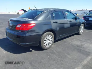 2010 Chrysler Sebring Touring with VIN 1C3CC4FB6AN207070, listed as a IAAI auction lot 42131880 with 155,362 mi miles. Bid and sale history available at carsss.com. Image 4.