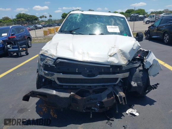2020 Ford F-150 XL with VIN 1FTEW1E57LFC71427, listed as a IAAI auction lot 42202609 with 61,435 mi miles and . Bid and sale history available at DreamBid. Image 6.