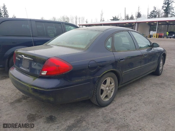 2001 Ford Taurus SEL with VIN 1FAFP56S71G166784, listed as a IAAI auction lot 41827761 with 98,465 mi miles. Bid and sale history available at carsss.com. Image 4.