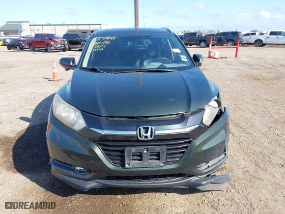 2016 Honda HR-V EX-L w/Navi with VIN 3CZRU5H74GM722552, listed as a IAAI auction lot 41491094 with 57,802 mi miles. Bid and sale history available at carsss.com. Image 12.