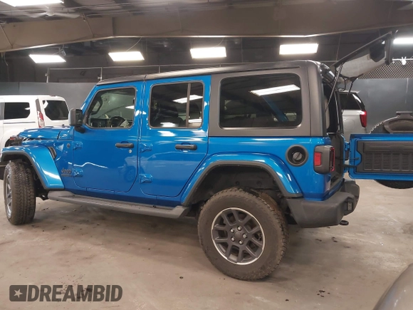 2021 Jeep Wrangler Unlimited Sport S with VIN 1C4HJXDN5MW717673, listed as a IAAI auction lot 42210527 with 35,635 mi miles and . Bid and sale history available at DreamBid. Image 3.