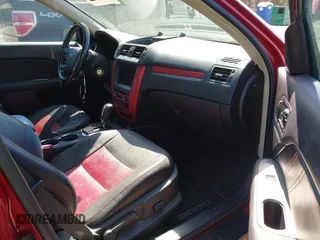 2010 Ford Fusion SPORT with VIN 3FAHP0DC3AR144734, listed as a IAAI auction lot 41853231 with 167,662 mi miles. Bid and sale history available at carsss.com. Image 5.