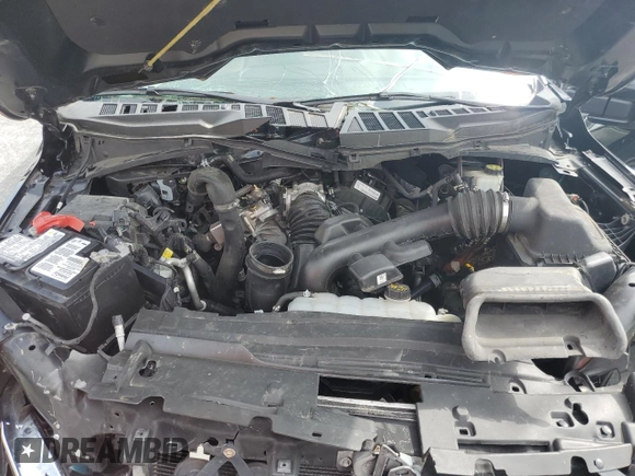 2023 Ford F-150 XL with VIN 1FTEW1C83PFA84267, listed as a Copart auction lot 65042545 with 54,508 mi miles and Salvage title. Bid and sale history available at DreamBid. Image 11.