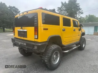 2003 Hummer H2 z VIN 5GRGN23U53H141743, wystawiony jako Copart lot #60153185 z przebiegiem 137 863 mil mil oraz Czysty tytuł • Clean title. Historia ofert i sprzedaży dostępna na DreamBid. Obrazek 4.