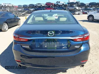 2021 Mazda 6 Grand Touring with VIN JM1GL1TY3M1619771, listed as a IAAI auction lot 40964809 with 25,816 mi miles and . Bid and sale history available at DreamBid. Image 16.