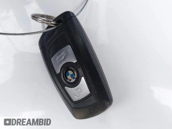 2013 BMW 3 Series 320i with VIN WBA3B1C53DK128602, listed as a IAAI auction lot 41952771 with 103,564 mi miles and . Bid and sale history available at carsss.com. Image 11.
