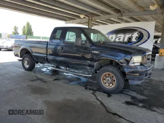2002 Ford F-250 XL с VIN 1FTNX21F12ED57693, выставлен на аукционе Copart как лот 62148855 с пробегом 149 950 миль миль и Чистый • Clean title. История ставок и продаж доступна на DreamBid. Изображение 4.