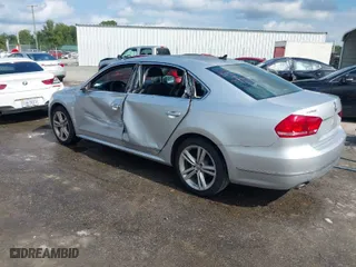 2013 Volkswagen Passat TDI SE w/Sunroof with VIN 1VWBN7A32DC125952, listed as a IAAI auction lot 40505763 with 149,055 mi miles. Bid and sale history available at carsss.com. Image 3.
