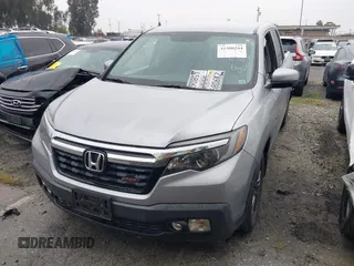 2018 Honda Ridgeline Sport with VIN 5FPYK2F19JB000713, listed as a IAAI auction lot 41300244 with 52,119 mi miles and . Bid and sale history available at DreamBid. Image 12.