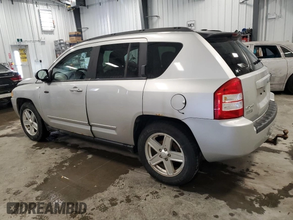 2010 Jeep Compass Sport with VIN 1J4NF4FB4AD512613, listed as a Copart auction lot 47548255 with 123,149 mi miles and Clean Title. Bid and sale history available at carsss.com. Image 2.