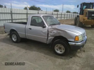 2001 Ford Ranger XL with VIN 1FTYR10C21PA47340, listed as a Copart auction lot 50261385 with 136,765 mi miles and Salvage title. Bid and sale history available at DreamBid. Image 4.