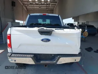 2019 Ford F-150 XL with VIN 1FTEW1E55KFB69767, listed as a IAAI auction lot 42326370 with 143,523 mi miles and . Bid and sale history available at DreamBid. Image 16.