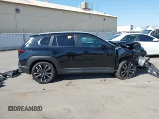 2023 Mazda CX-50 Meridian Edition z VIN 7MMVABXY1PN149136, wystawiony jako IAAI lot #42587764 z przebiegiem 4 748 mil mil oraz . Historia ofert i sprzedaży dostępna na DreamBid. Obrazek 14.