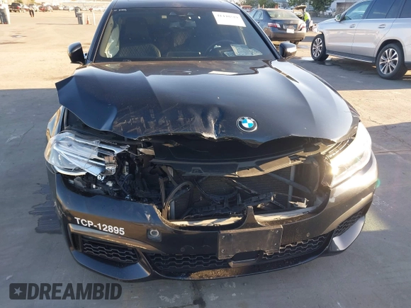 2018 BMW 7 Series 750i with VIN WBA7F0C50JGM24160, listed as a IAAI auction lot 41448519 with 138,742 mi miles. Bid and sale history available at carsss.com. Image 6.