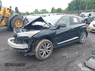 2019 Acura RDX Technology with VIN 5J8TC2H52KL030992, listed as a IAAI auction lot 42459982 with 77,042 mi miles and . Bid and sale history available at DreamBid. Image 2.