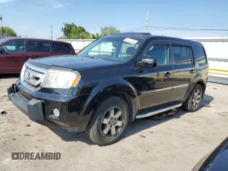 2010 Honda Pilot Touring z VIN 5FNYF4H99AB012193, wystawiony jako Copart lot #64228865 z przebiegiem 217 586 mil mil oraz Czysty tytuł • Clean title. Historia ofert i sprzedaży dostępna na DreamBid. Obrazek 1.
