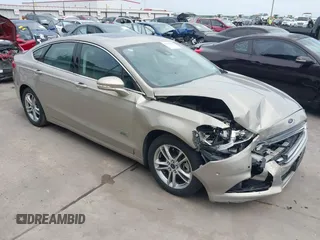 2015 Ford Fusion Energi Titanium with VIN 3FA6P0SU3FR114739, listed as a IAAI auction lot 42003011 with 120,553 mi miles. Bid and sale history available at carsss.com. Image 1.