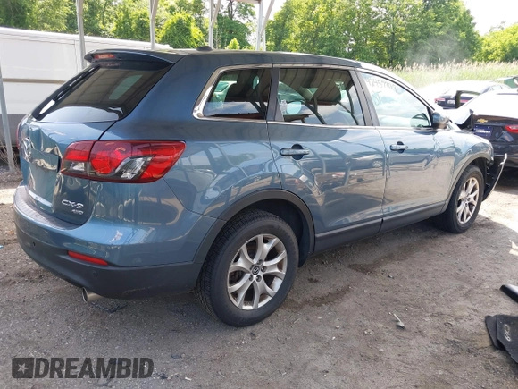 2014 Mazda CX-9 Touring with VIN JM3TB3CV7E0440747, listed as a IAAI auction lot 42457709 with 166,588 mi miles and . Bid and sale history available at DreamBid. Image 4.