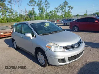 2012 Nissan Versa S with VIN 3N1BC1CP7CK253573, listed as a IAAI auction lot 42035812 with 97,026 mi miles. Bid and sale history available at carsss.com. Image 1.
