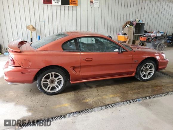 1997 Ford Mustang GT with VIN 1FALP42X3VF130827, listed as a Copart auction lot 60529995 with 112,799 mi miles and Salvage title. Bid and sale history available at DreamBid. Image 3.