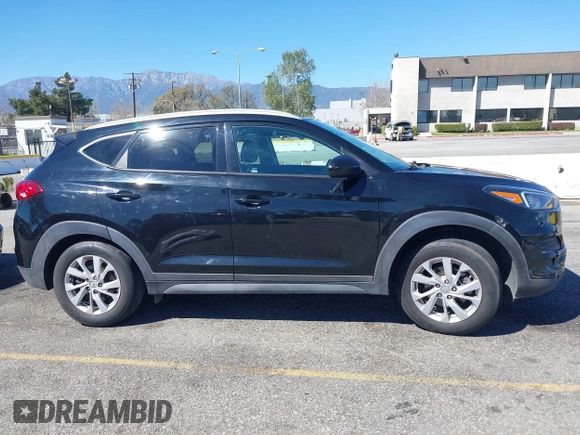 2021 Hyundai Tucson Value z VIN KM8J33A43MU306697, wystawiony jako IAAI lot #41869100 z przebiegiem 129 776 mil mil oraz . Historia ofert i sprzedaży dostępna na DreamBid. Obrazek 13.