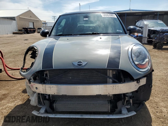 2015 MINI Hardtop with VIN WMWXM5C5XFT974077, listed as a Copart auction lot 58063965 with 93,853 mi miles and Salvage title. Bid and sale history available at DreamBid. Image 5.