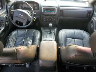 2002 Jeep Grand Cherokee Limited with VIN 1J4GX58S82C230247, listed as a Copart auction lot 73573554 with 160,357 mi miles and Salvage Title. Bid and sale history available at DreamBid. Image 8.