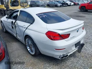 2015 BMW 6 Series 650i xDrive with VIN WBA6B4C53FD899938, listed as a IAAI auction lot 41761114 with 93,015 mi miles and . Bid and sale history available at carsss.com. Image 3.