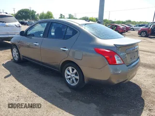 2012 Nissan Versa SV with VIN 3N1CN7AP8CL906636, listed as a IAAI auction lot 42007827 with 111,627 mi miles. Bid and sale history available at carsss.com. Image 3.