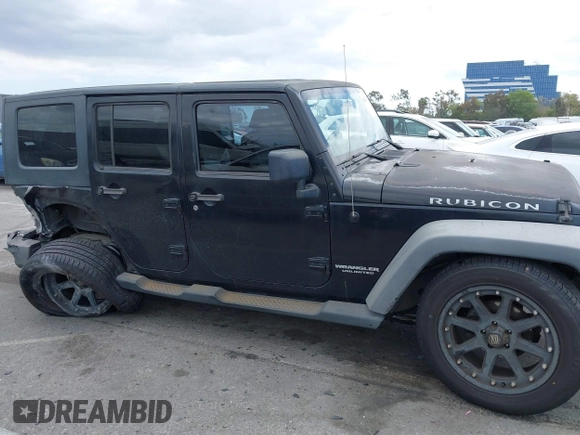 2007 Jeep Wrangler Unlimited X with VIN 1J4GB391X7L172965, listed as a IAAI auction lot 42040337 with 170,482 mi miles and . Bid and sale history available at DreamBid. Image 13.