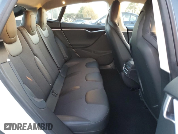 2015 Tesla Model S 85D with VIN 5YJSA1S21FF087461, listed as a Copart auction lot 87027334 with 53,868 mi miles and Salvage Title. Bid and sale history available at carsss.com. Image 10.