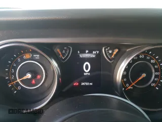 2023 Jeep Wrangler Sport with VIN 1C4HJXDN1PW701944, listed as a Copart auction lot 69973104 with 24,733 mi miles and Salvage Title. Bid and sale history available at DreamBid. Image 9.