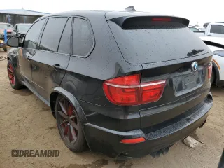 2013 BMW X5 M with VIN 5YMGY0C57DLL15713, listed as a Copart auction lot 63649584 with 0 mi miles and Salvage Title. Bid and sale history available at carsss.com. Image 2.